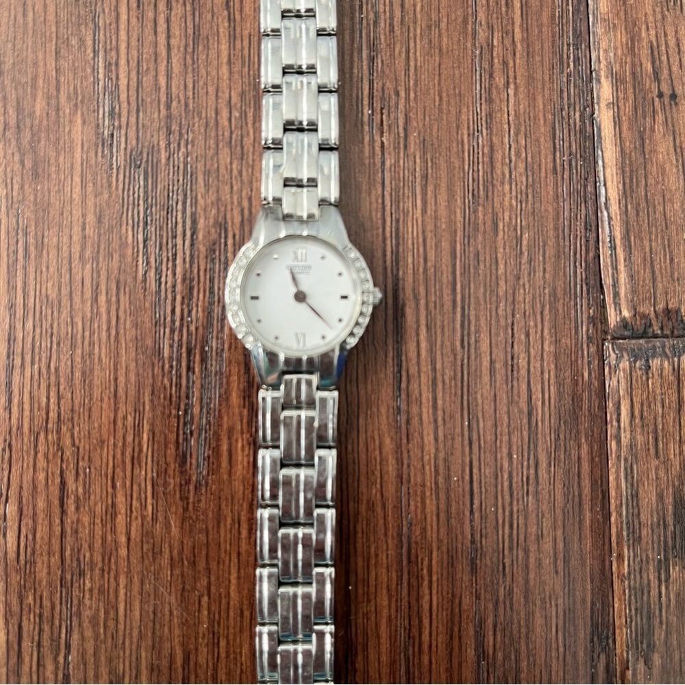 Citizen  women’s watch stainless steel white round face rhinestones needs repair
